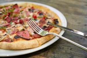 Pizza et regime : peut-on en manger sans culpabiliser ?